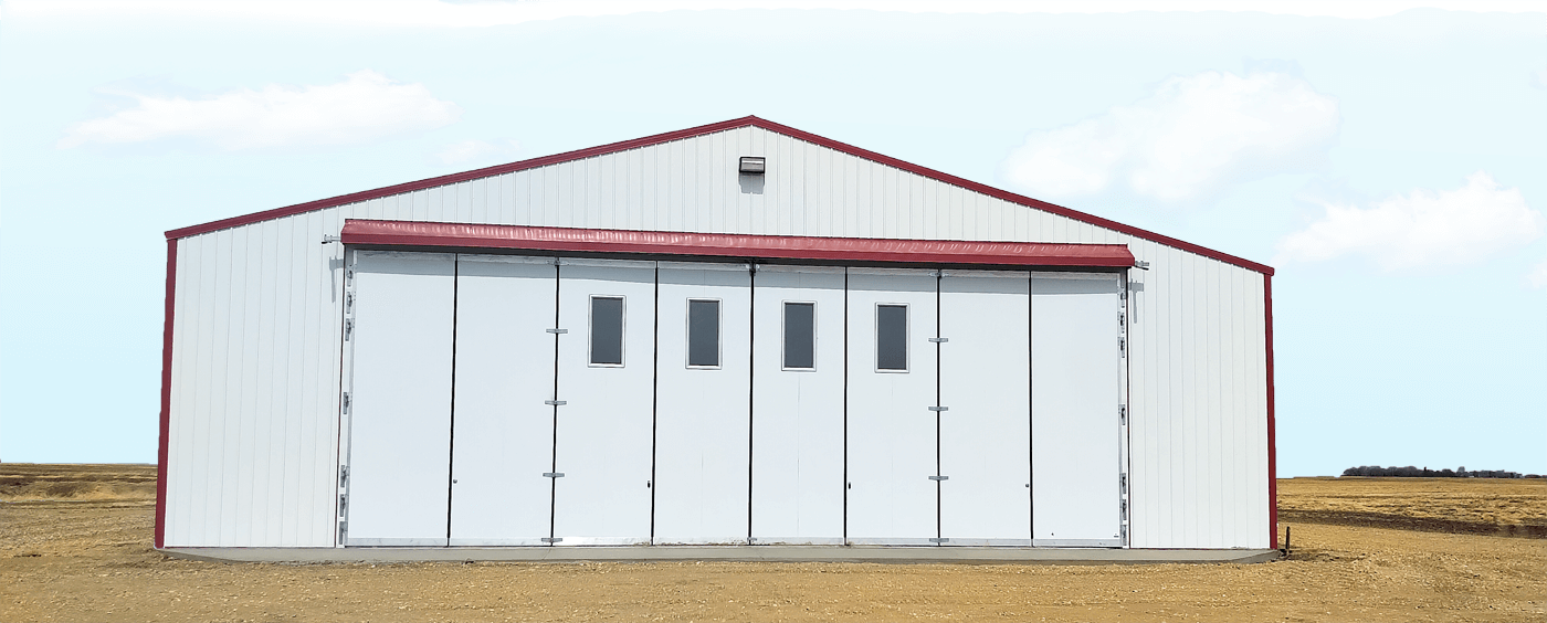 A S.E. Saskatchewan Agricultural Building with a FINDOOR - Banner