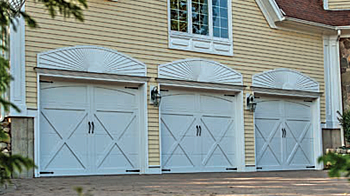 Steel Overlay Carriage House, Model 5334A shown in
white and spade hardware